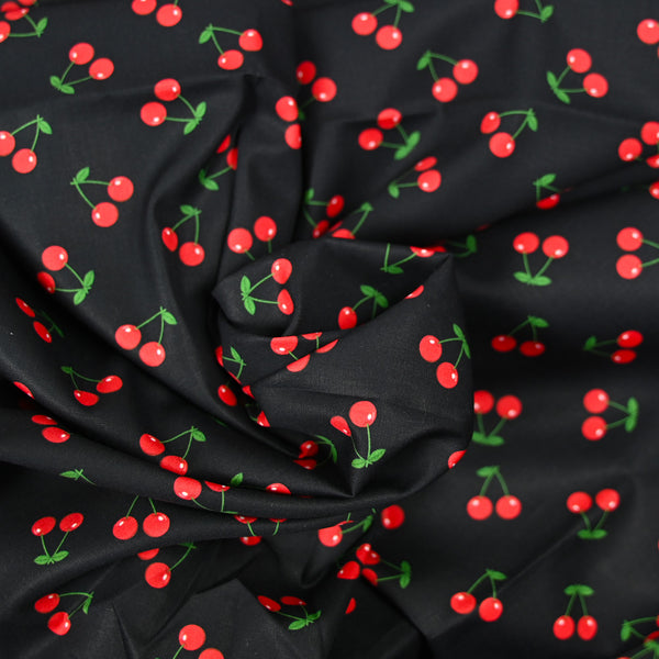 Coton imprimé duo de cerises fond noir