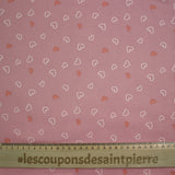 Jersey tout doux imprimé petits cœurs fond rose