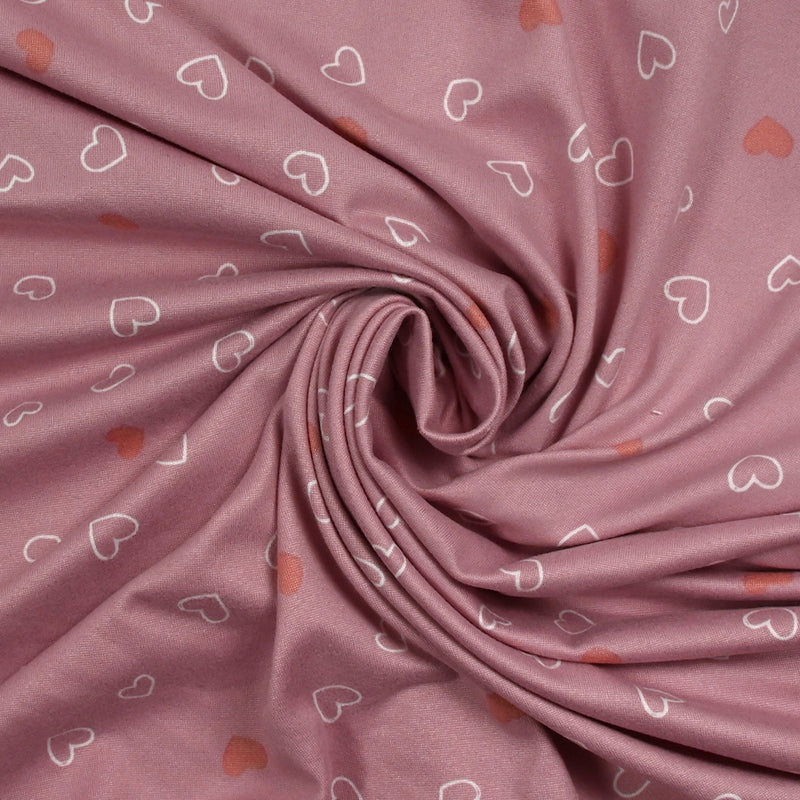Jersey tout doux imprimé petits cœurs fond rose