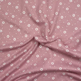 Jersey tout doux imprimé marguerite fond rose