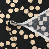 Crêpe viscose imprimé à pois beige fond noir