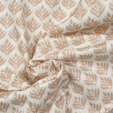 Popeline enduite imprimée végétal beige fond blanc cassé