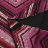 Maille Milano polyviscose chevron fantaisie magenta fond noir