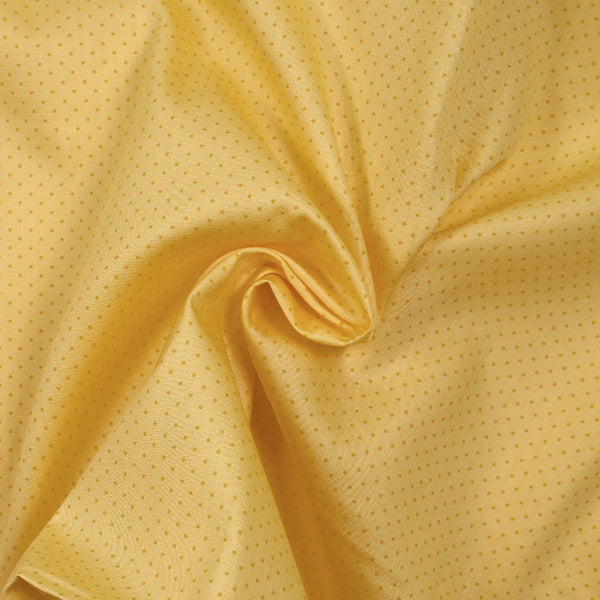 Coton imprimé petits pois 1mm jaune fond jaune pâle