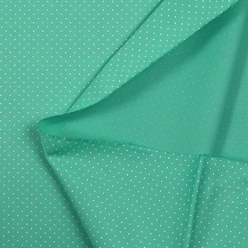 Coton imprimé mini pois fond turquoise