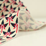 Cotton and viscose graphic print with red ecru background