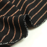 Orange striped wool black background
