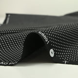 Coton imprimé pois 1mm fond noir