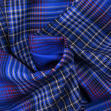 Red and beige checked wool, blue background