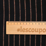 Orange striped wool black background