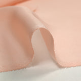 Mousseline de 100% soie unie rose pêche