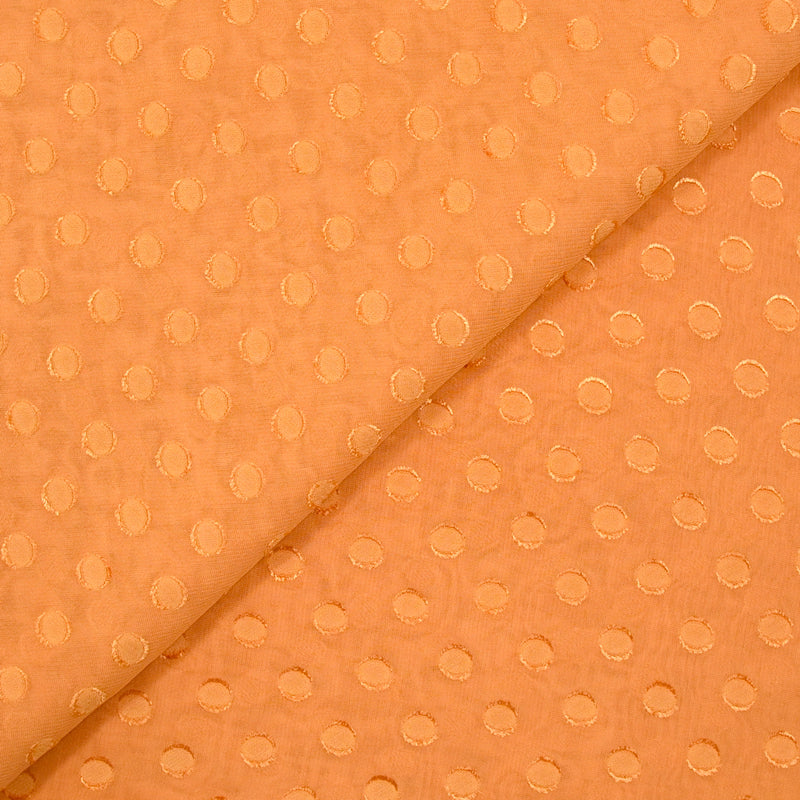 Crêpe georgette viscose à pois jacquard orange brûlée