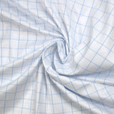 Popeline polycoton tissée-teinte à carreaux Barnabé bleu fond blanc