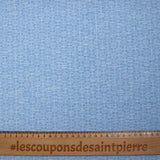 Popeline polycoton imprimée carreaux en pointillisme fond bleu chiné