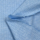 Popeline polycoton imprimée carreaux en pointillisme fond bleu chiné