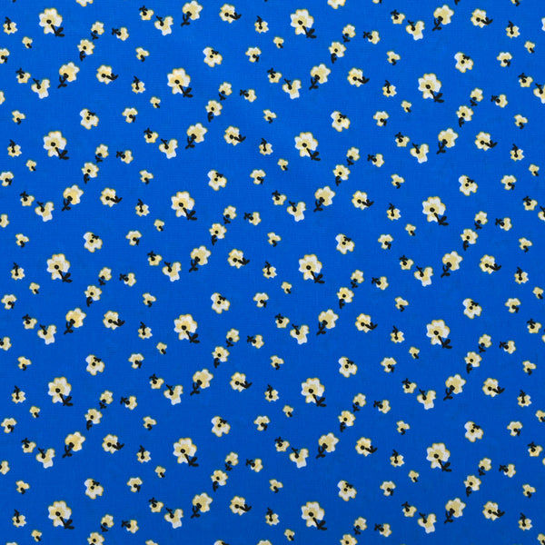 Crêpe de polyester imprimé petites fleurs fond bleu roi