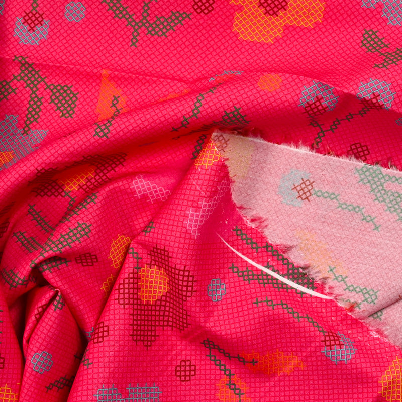 Coton imprimé fleurs fond magenta