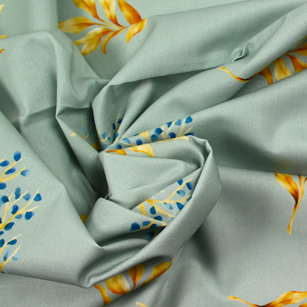 Coton imprimé branche fond gris bleu