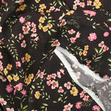 Viscose imprimée fleurs fuchsia et ocre fond marron