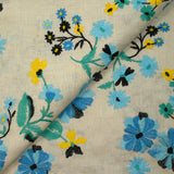 100% Lin brodé fleurs turquoise, vert et jaune fond ficelle