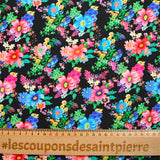 Sergé de coton et viscose champs de fleurs fond noir