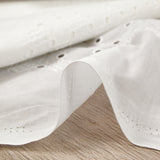 Broderie anglaise Lyra blanc cassé