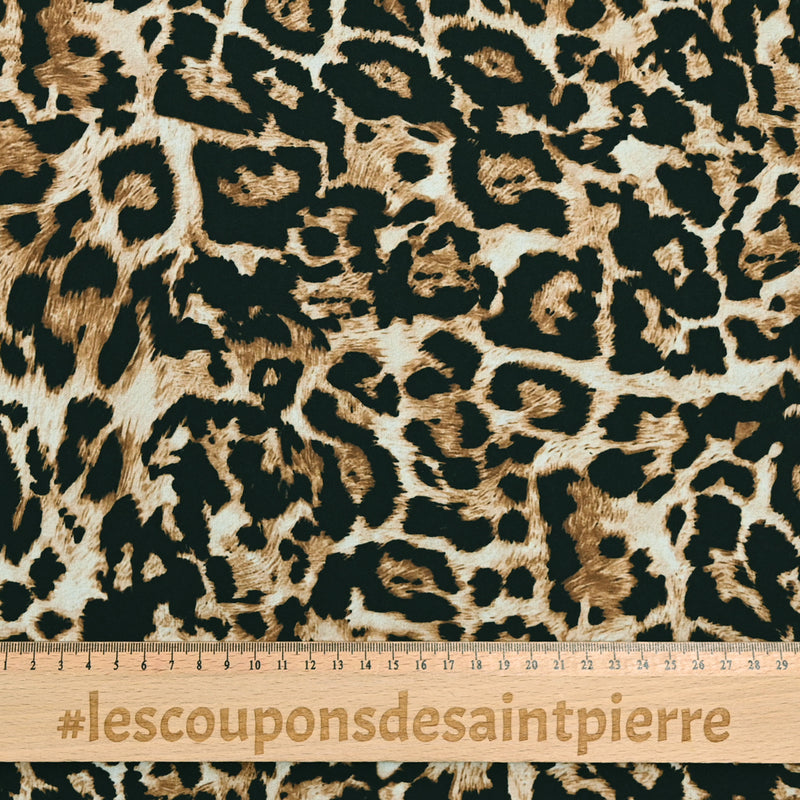Polyester imprimé zoom léopard noir et camel
