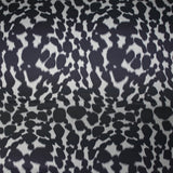 Satin de polyester imprimé fauve fond gris