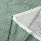 Printed cotton poplin The leaves steal green background water