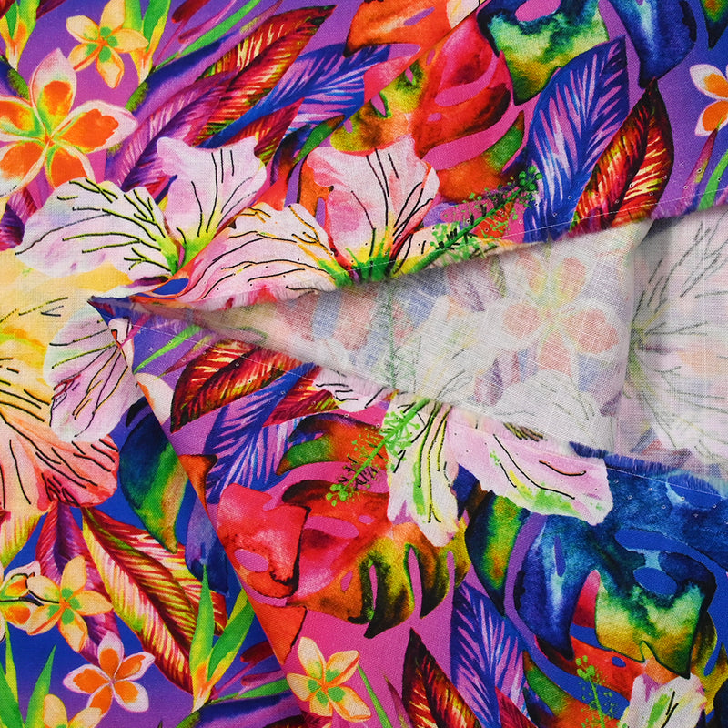 Coton imprimé sous les tropiques fond bleu roi, violet et fuchsia