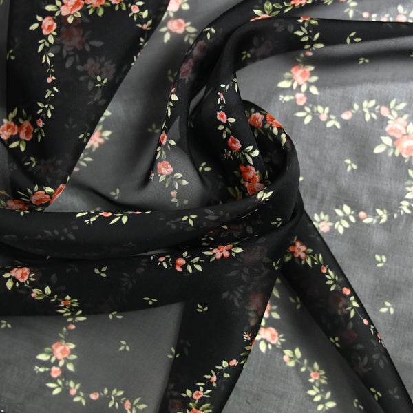 Mousseline 100% soie imprimée serpent de fleurs fond noir