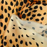 Satin polyester imprimé guépard fond camel