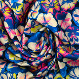 Satin polyester imprimé fleurs néon fond noir