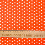 Coton imprimé étoile 1cm orange