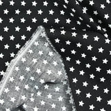 Coton imprimé étoile 1cm noir