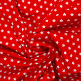 Coton imprimé étoile 1cm rouge