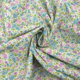 Piqué de coton imprimé les fleurs de Sarah bleu et violet fond blanc