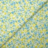 Piqué de coton imprimé les fleurs de Sarah bleu et jaune fond blanc