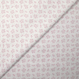 Piqué de coton imprimé brindille dans le vent vieux rose fond blanc