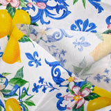 Polycotton printed lemon and flowers white background
