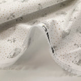 Piqué de coton imprimé hérisson et pois taupe fond blanc