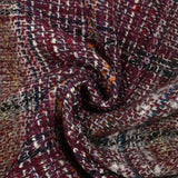 Capucine wool blend tweed, navy and black line, wine background