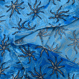Jersey de velours lurex étoile des mers fond bleu