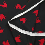 Crêpe viscose léger imprimé cœurs rouges fond noir