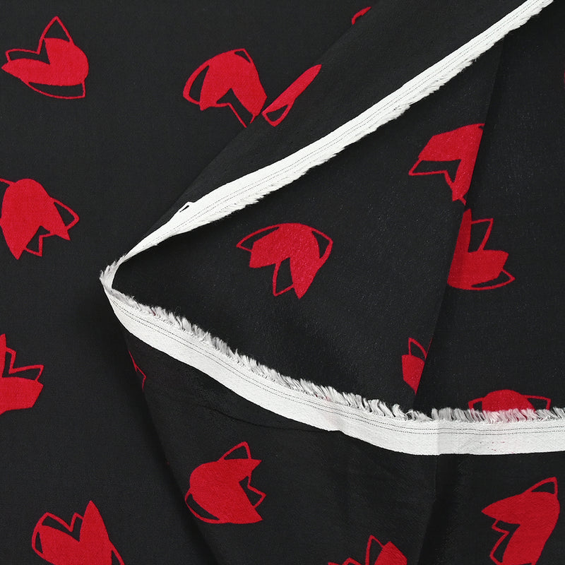 Crêpe viscose léger imprimé cœurs rouges fond noir