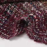 Capucine wool blend tweed, navy and black line, wine background