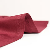 Tissu tailleur en polyviscose sergé lie de vin