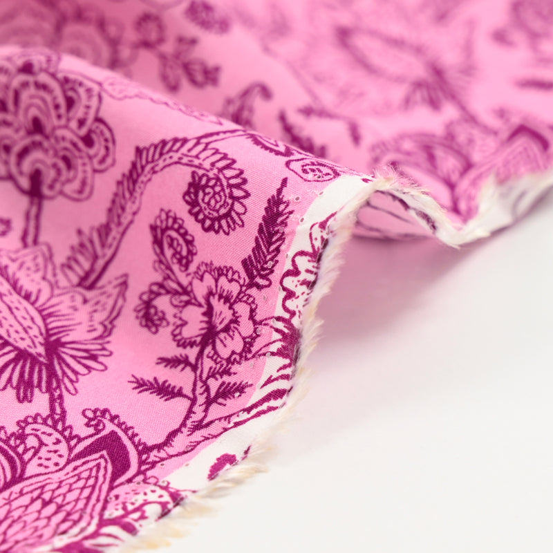 Printed viscose outline of flowers pink background
