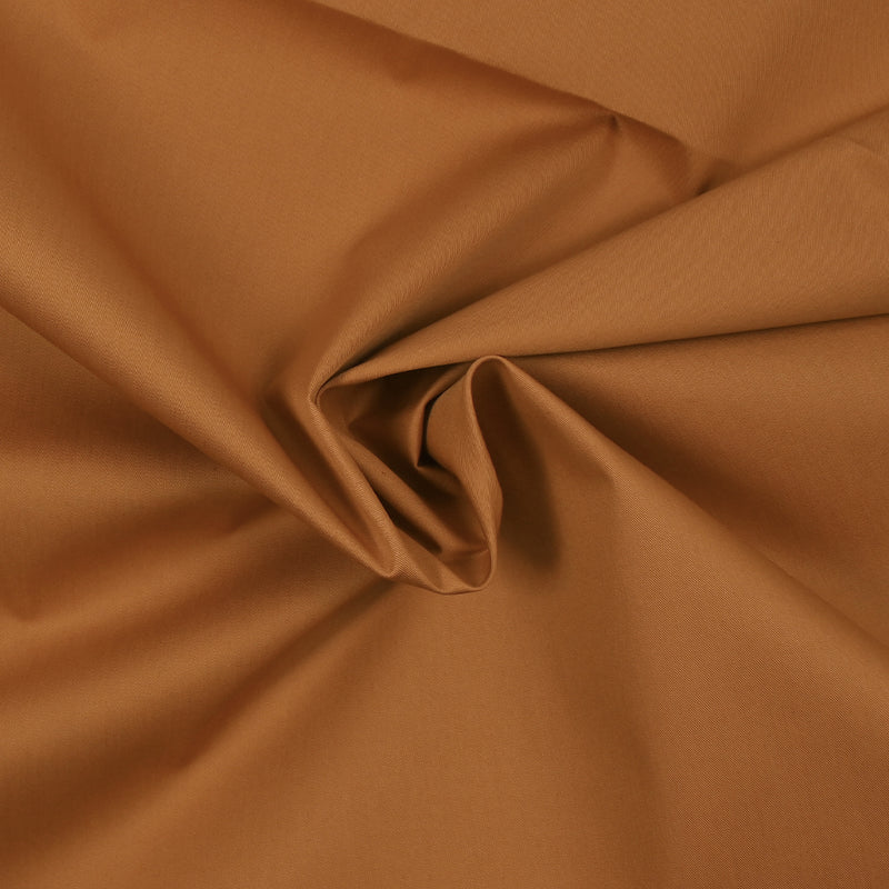 Sergé de coton élasthanne orange brûlé