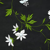 Crêpe de chine brodé Nina fond noir au mètre